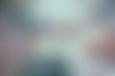 Nonprofit staff collaborating during a strategic planning meeting around a table.