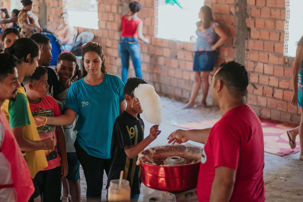 Volunteers handing out food at a community outreach event.
