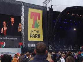 Margit van der Zwan plays the cello on stage with Elbow at festival T in the Park for BBC. CLoseup of the band elbow