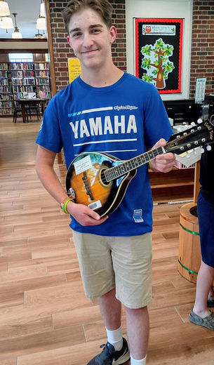 Discover the Treasure Trove of Musical Instruments and Books at Bonney Memorial Library!