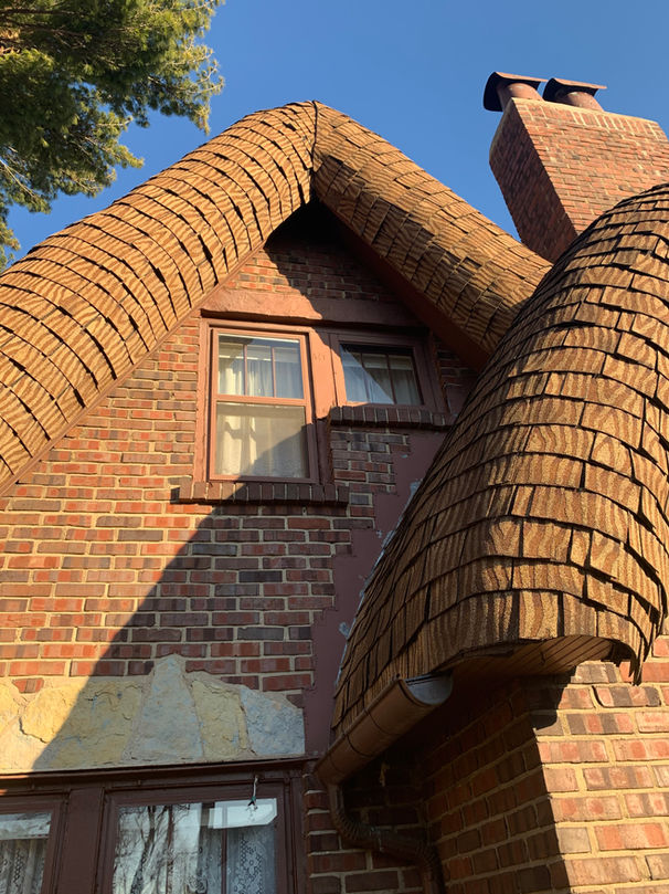 Asphalt Shingles over Wood Shingles