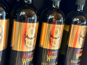 A row of Hellysium Wine bottles