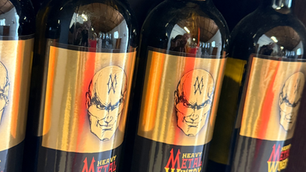 A row of Hellysium Wine bottles
