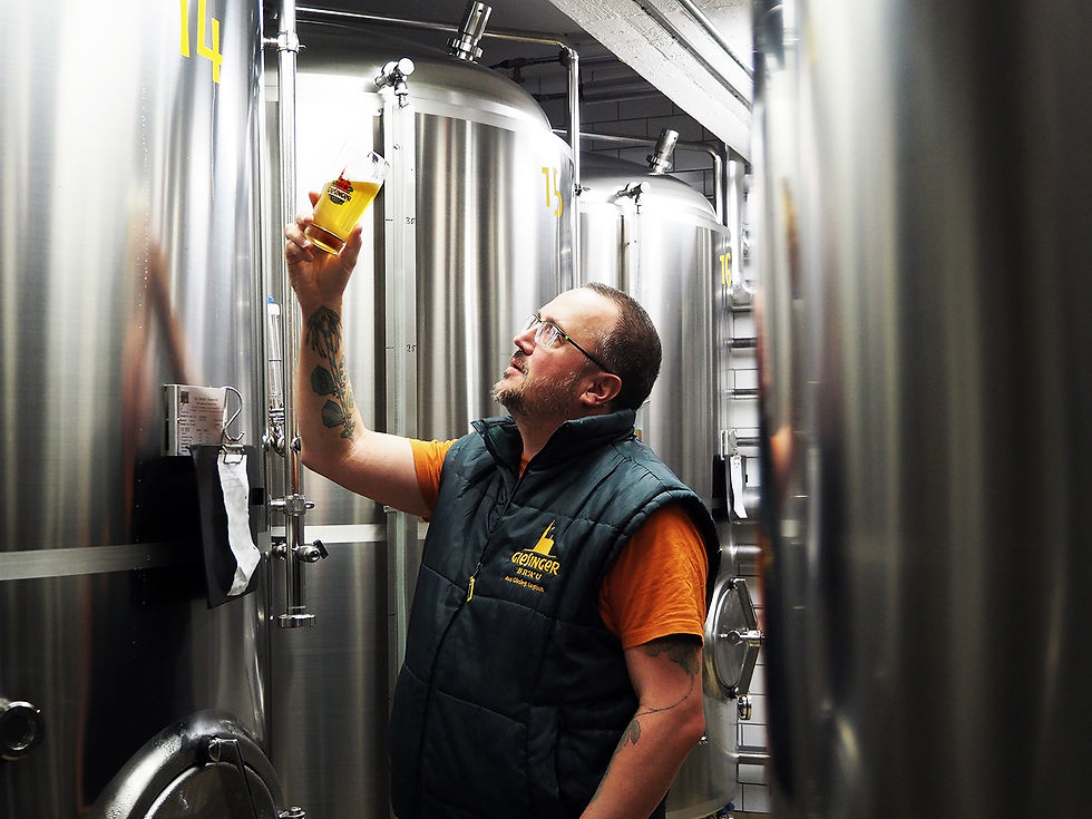 Steffen inspects his beer