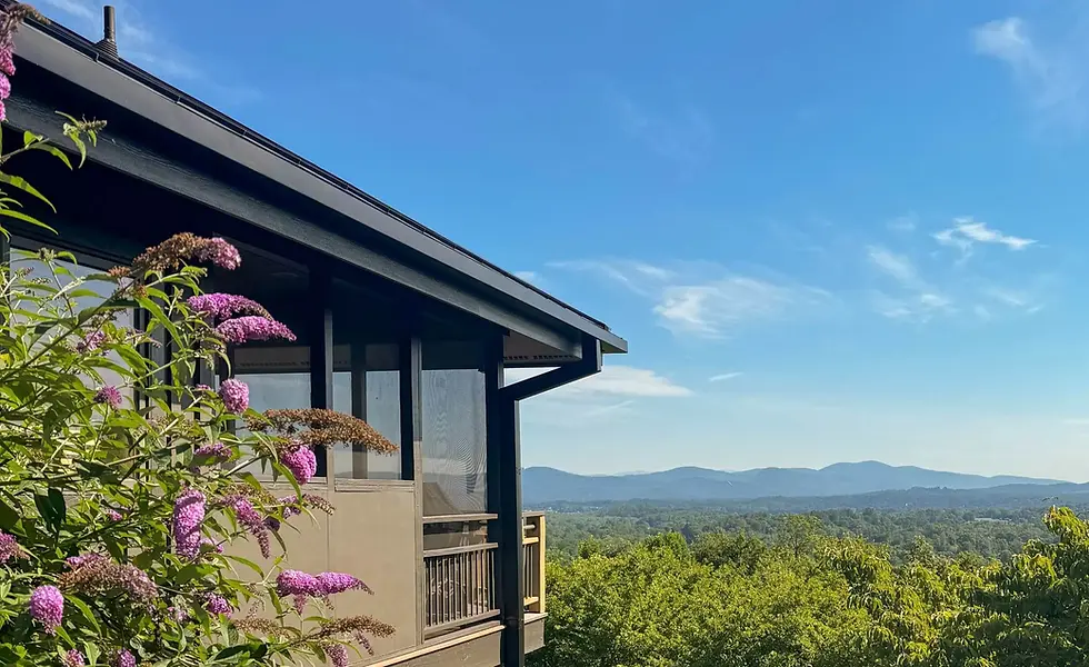 Seamless gutter installation on residential home in Asheville NC by Express Gutters