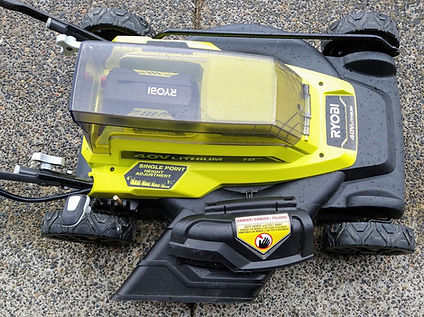 2022_04_19-3 RYOBI 40V Battery Lawnmower - top view with battery installed and safety key.