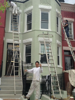 Experienced brick painters delivering a smooth finish on brick walls in Arlington, VA