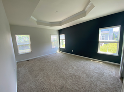 Beautiful bedroom painted a deep blue and gray, in Herndon, by Charles Graves Painting Company