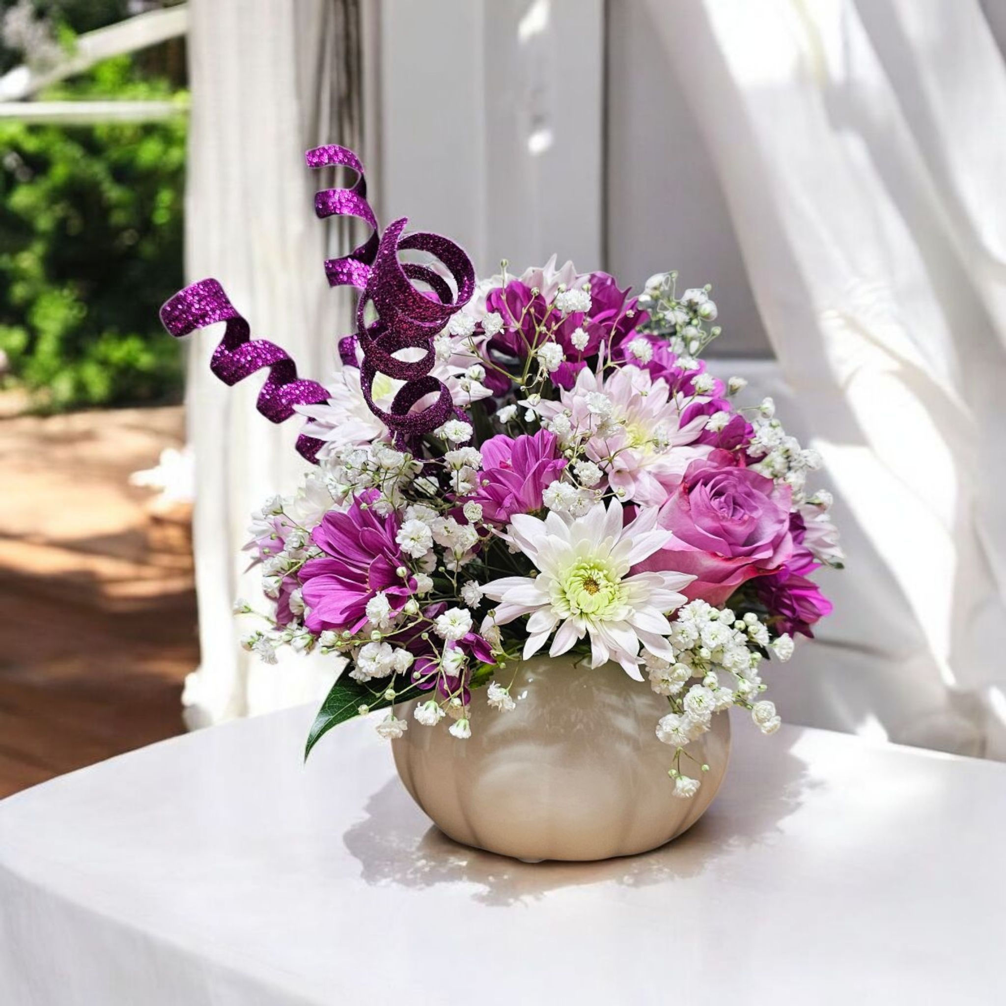 Pumkin arrangement in front of window