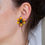 Thumbnail: Model wearing The Adventurer Earrings – Handcrafted Glass Bead Earrings in yellow