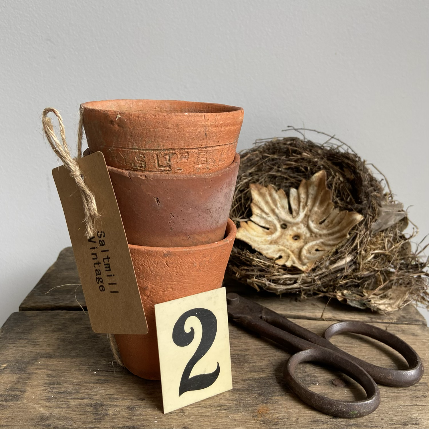 A Set of Three Vintage Terracotta Plant Pots
