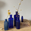 Thumbnail: A Set of 5 Antique Blue Glass Bottles 