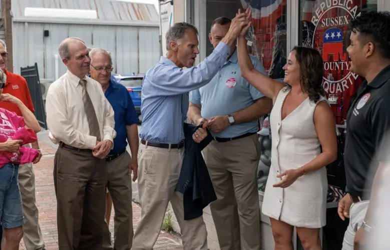 Rep Ron Gray congratulates Nikki Miller