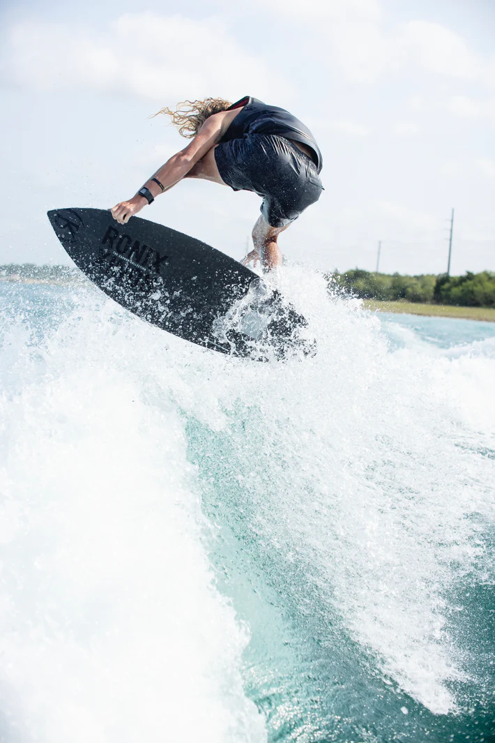 man wakesurfing on a ronix wakesurf