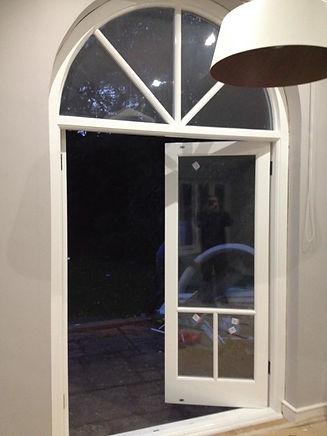 White door with arch window