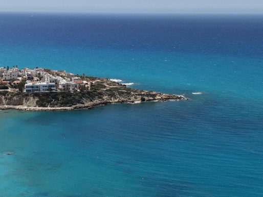 Coastal Cyprus homes illustrating the property VAT first-occupation alert effective 1 September 2026.