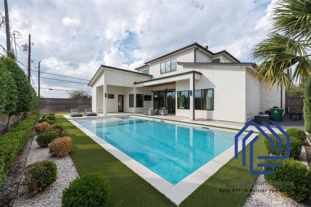 Gorgeous backyard with pool, and covered patio.
