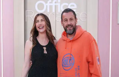 Adam Sandler shocks the red carpet again: wears Knicks hoodie to support his wife’s film premiere.
