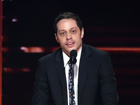 Pete Davidson shocks audiences by referencing Charlie Kirk and calling Kanye West a “gay Nazi” in a roast performance that sparks massive public backlash and controversy.