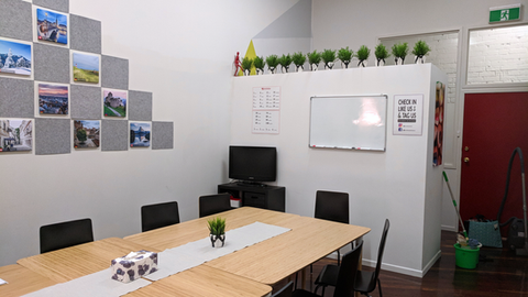 Learning space at DerDieDas with desks, chairs, and German teaching aids