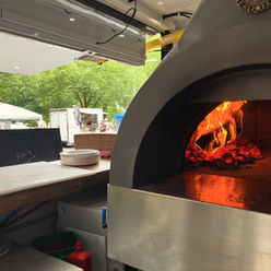 Pizza food truck ready to serve hot slices