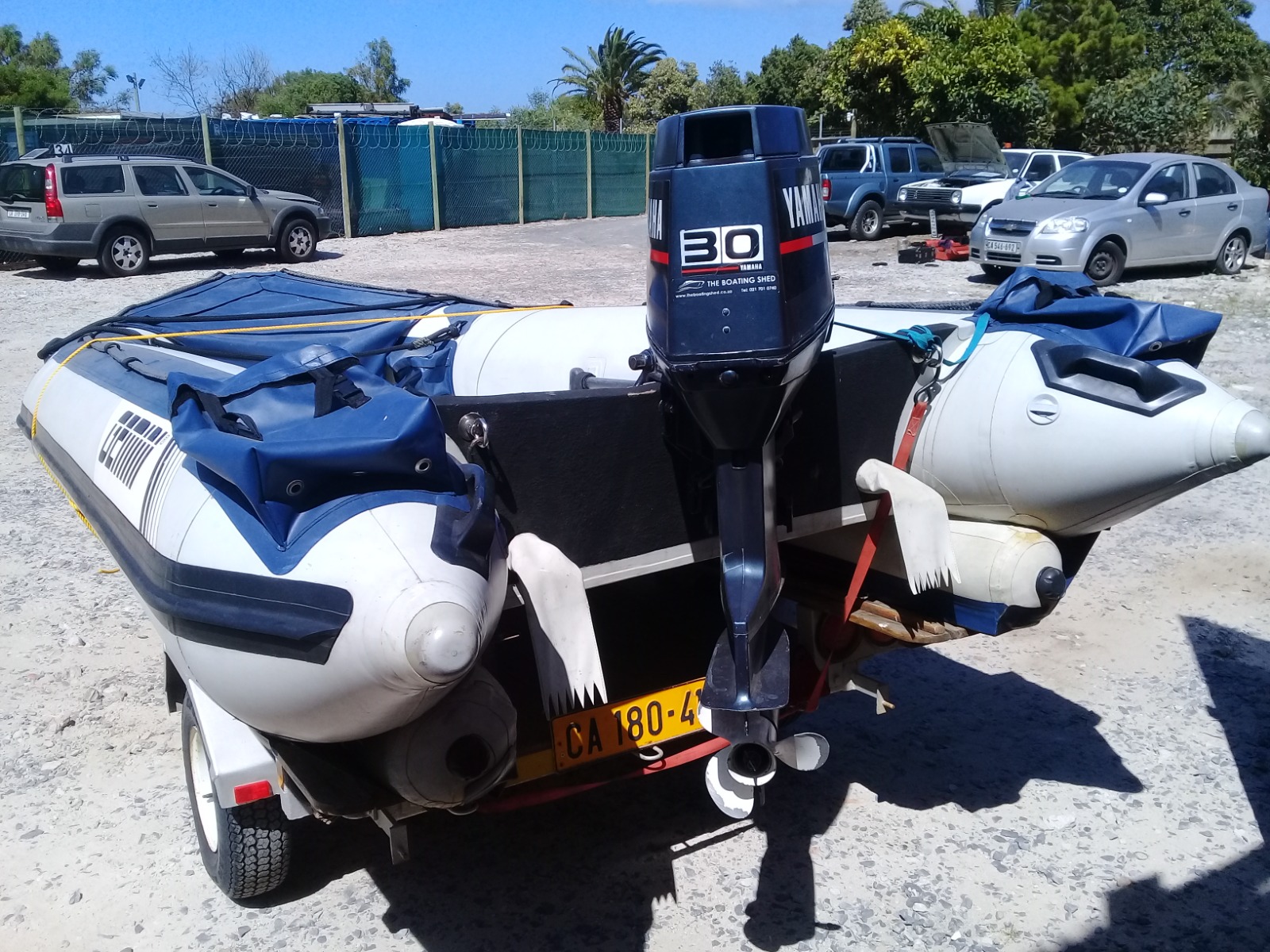 Outboard motor being serviced