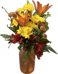 A medium arrangement featuring lilies, daisies, and alstroemeria.