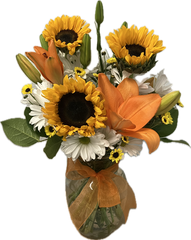 A medium arrangement with sunflowers and lilies.
