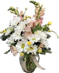 A medium arrangement with daisies and snapdragons.