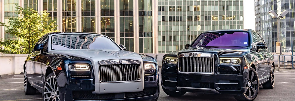Black luxury sedan parked curbside for a wedding pickup.