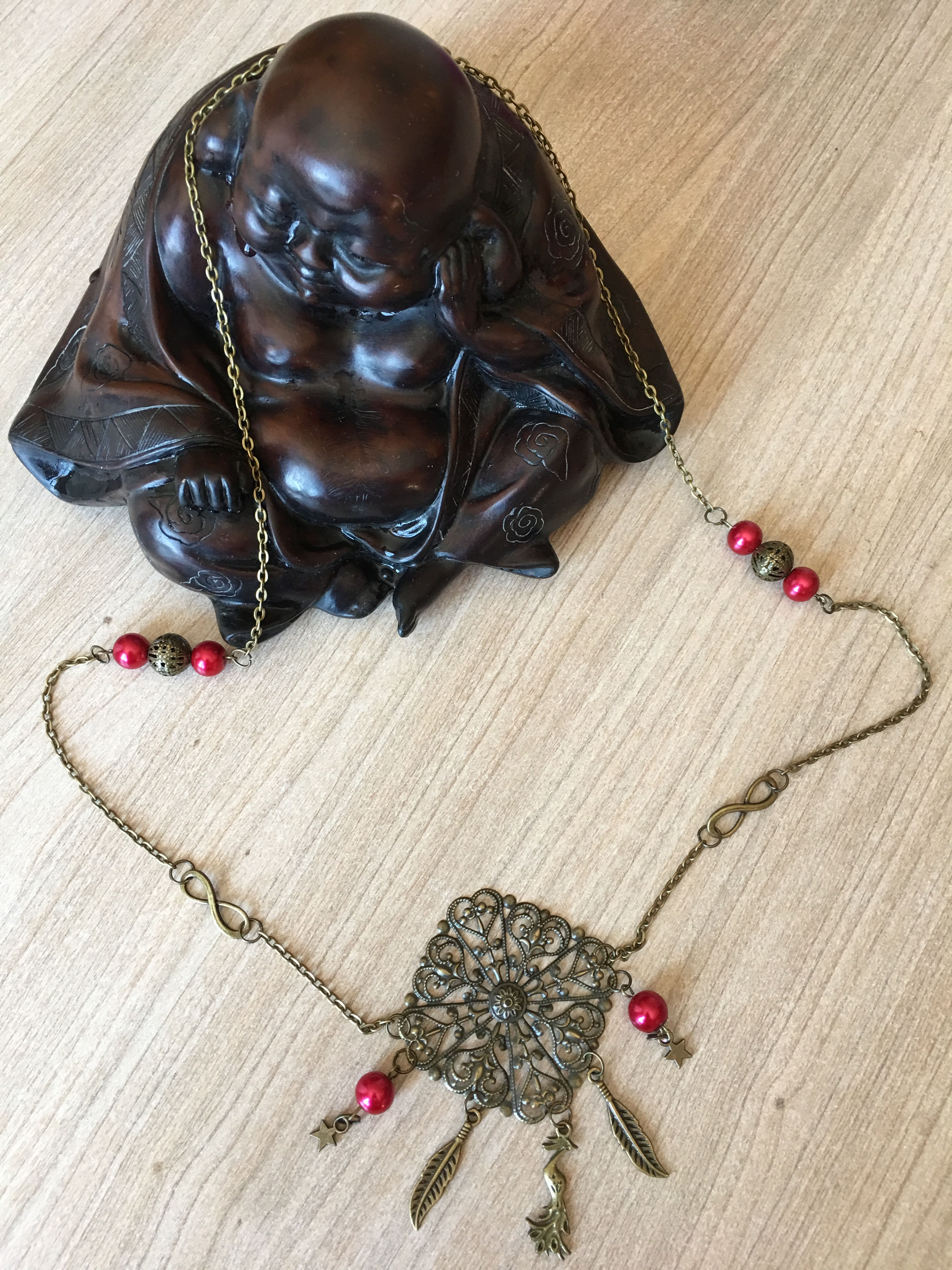 Sautoir Bronze Paon Perles Rouge