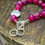 Thumbnail: Fuchsia Agate Gemstones w Silver Circle Charm, Clasp + Rings on Silk String