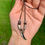 Thumbnail: Silver Tooth Pendant Necklace + Accent Beads on Brown Cotton Cording