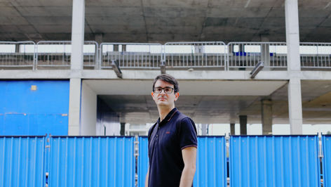 David stood in front of a building site