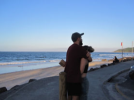 Travelers on the beach in Byron Bay on the east coast of Australia