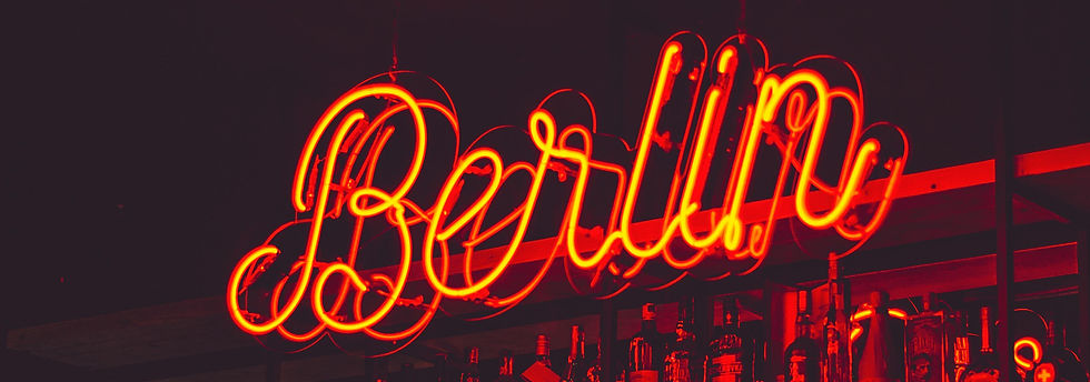 Neon bar sign representing Berlin’s nightlife scene