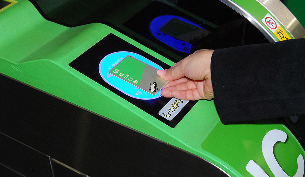 JR train gates with Suica card readers in Tokyo station