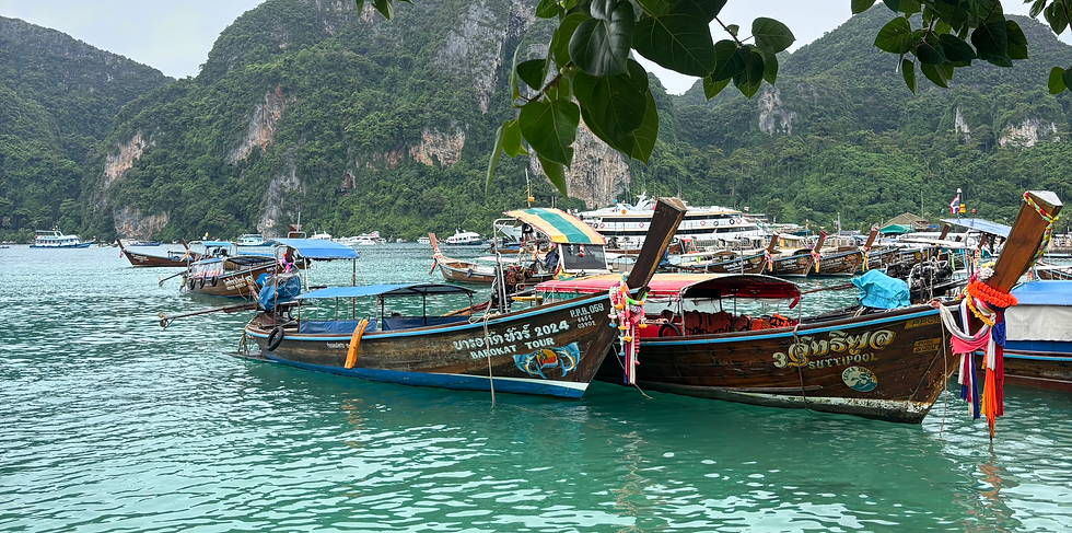 Traditional longtail boats in the Phi Phi Islands used to move between beaches and islands