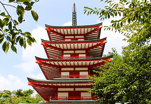 Mount Fuji with the red torii gate at Arakura Sengen Shrine in Japan