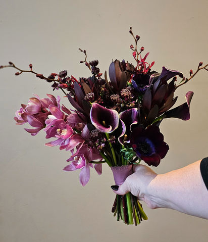 Moody orchid and calla lily bouquet
