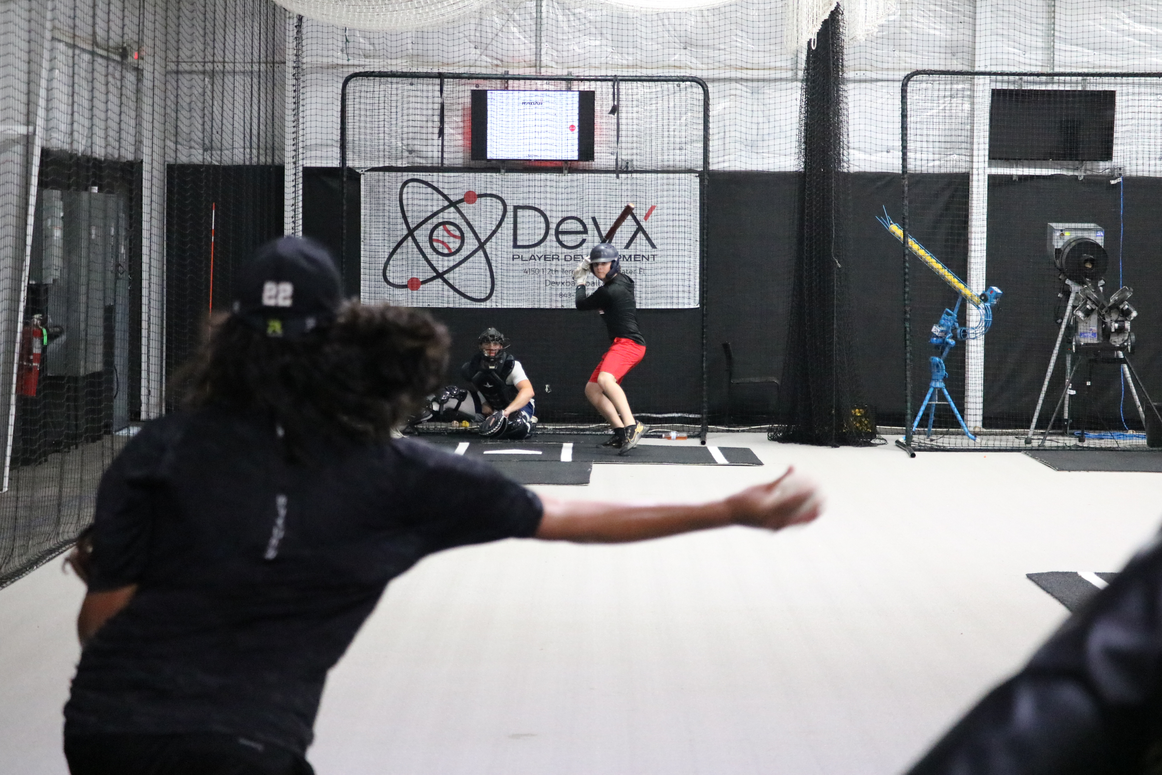 DevX Player Development — batting cages in Tampa Bay