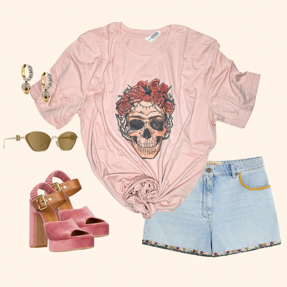 FOREVER FRIDA graphic tee styled with denim shorts, pink velvet heels, and sunglasses – bold skull shirt for women.