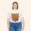 Thumbnail: Plus-size model smiling in white tiger graphic tee, showcasing flattering relaxed fit.