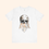 Thumbnail: Flat lay of All or Nothing T-Shirt on beige, skull graphic, neutral street style.