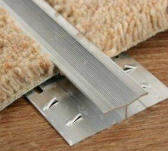 Silver carpet to carpet door bar