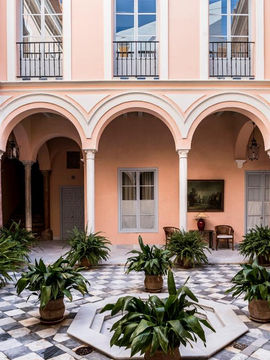 Palacio Mármoles is a condo hotel featuring rooms with free Wifi and air conditioning in the center of Seville. There's a private entrance at the condo hotel for the convenience of those who stay. Every room includes a patio with city views.