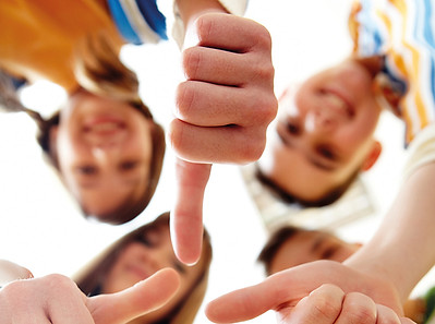 Kids with thumbs up