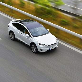 Electric Car on Highway_edited.jpg