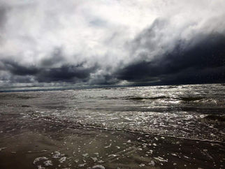 Cloudy with winds throughout the day