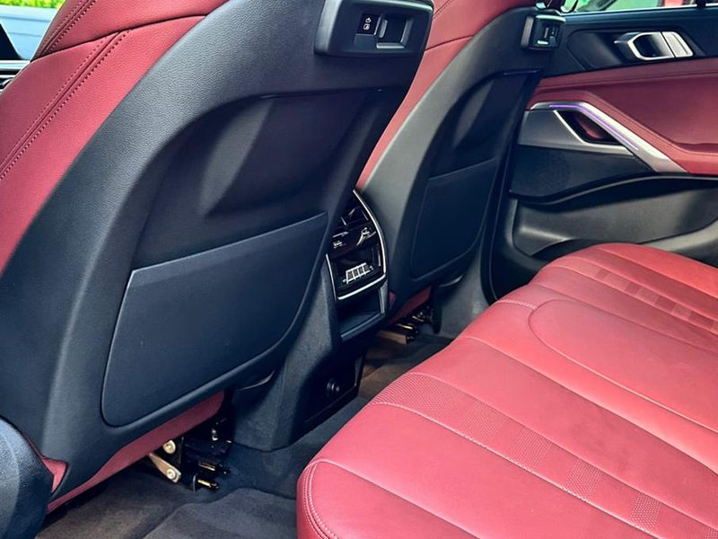 Red leather seats cleaned and conditioned